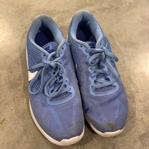 Blue Nike tennis shoes
